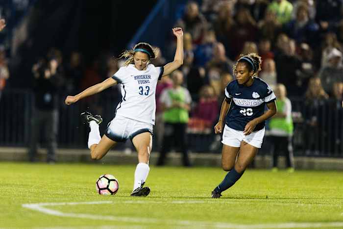 Ashley Hatch passes the ball against Ari Davis Gonzaga on Nov. 5, 2016. Credit: The Daily Universe